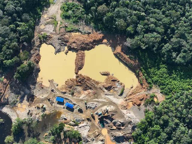 Mining trucks and processing area