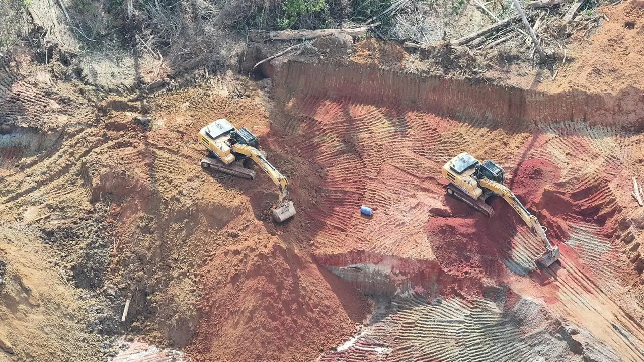 Aerial view of two excavators stripping ground at the pit on the Minerales San Hilario concession in Peru.